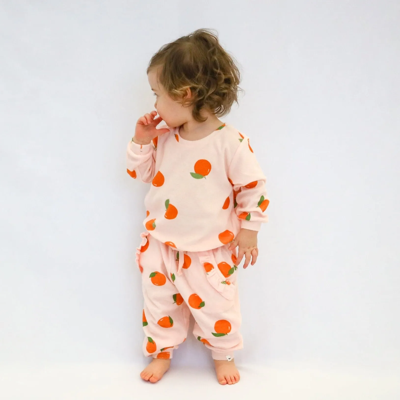 oh baby! Cotton Terry Ruffle Pocket Jogger - Oranges Print - Pale Pink